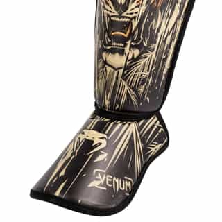 detski protektori za kraka venum tiger kids black neon orange 3 детски протектори за крака venum tiger kids black/neon orange 3