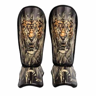 detski protektori za kraka venum tiger kids black neon orange детски протектори за крака venum tiger kids black/neon orange