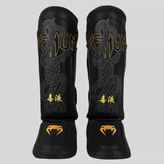 protektori za kraka venum serpenti black silver gold 1 протектори за крака venum serpenti black/silver/gold 1