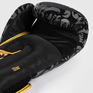boksovi rykavici venum x Ilia topuria unmatched boxing gloves – black gold 2 боксови ръкавици venum x Ilia topuria unmatched boxing gloves - black/gold 2